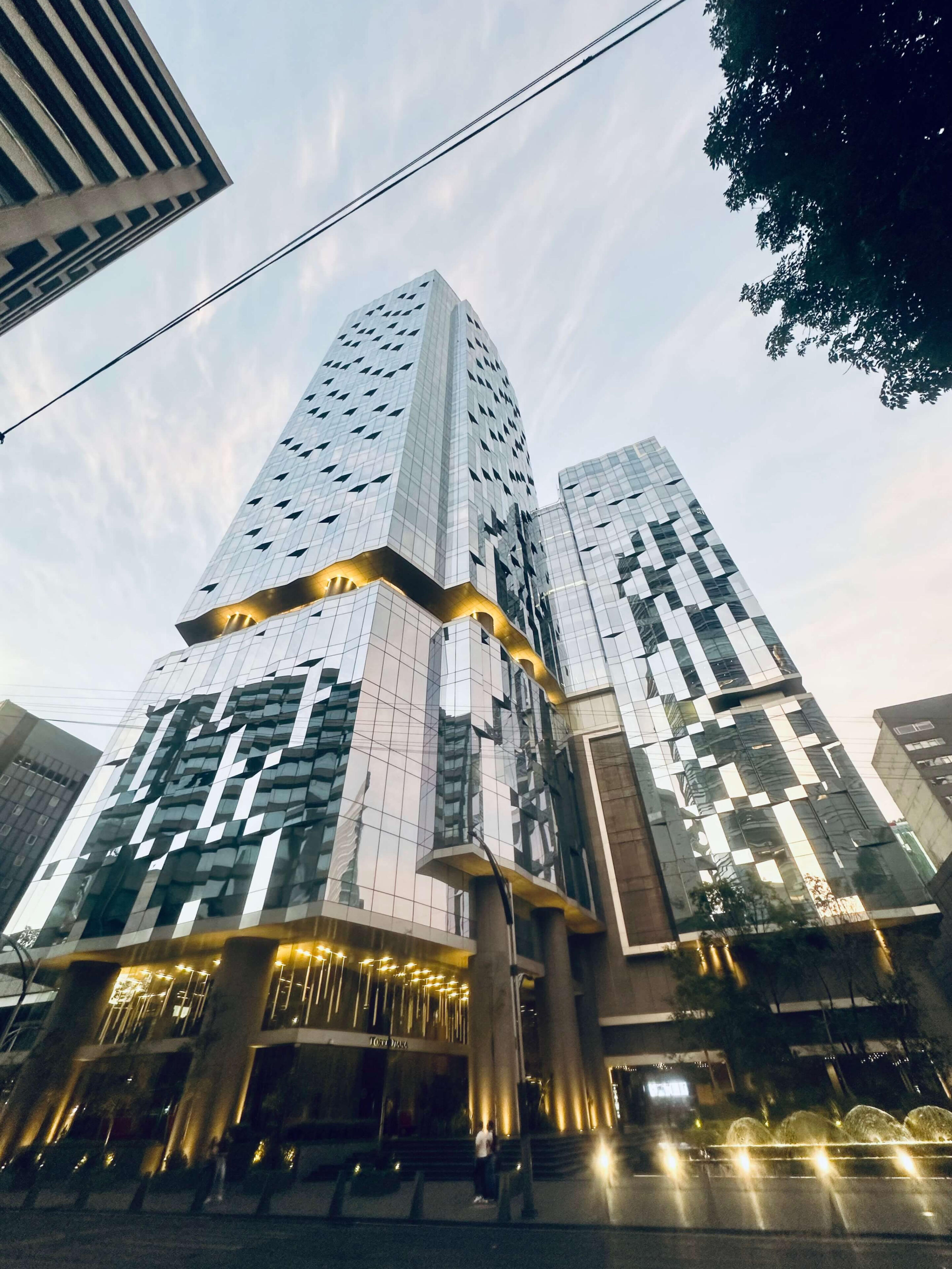 Reforma bulding Modern glass skyscrapers in Mexico City's skyline, showcasing the contemporary architectural side of our city walking tours..