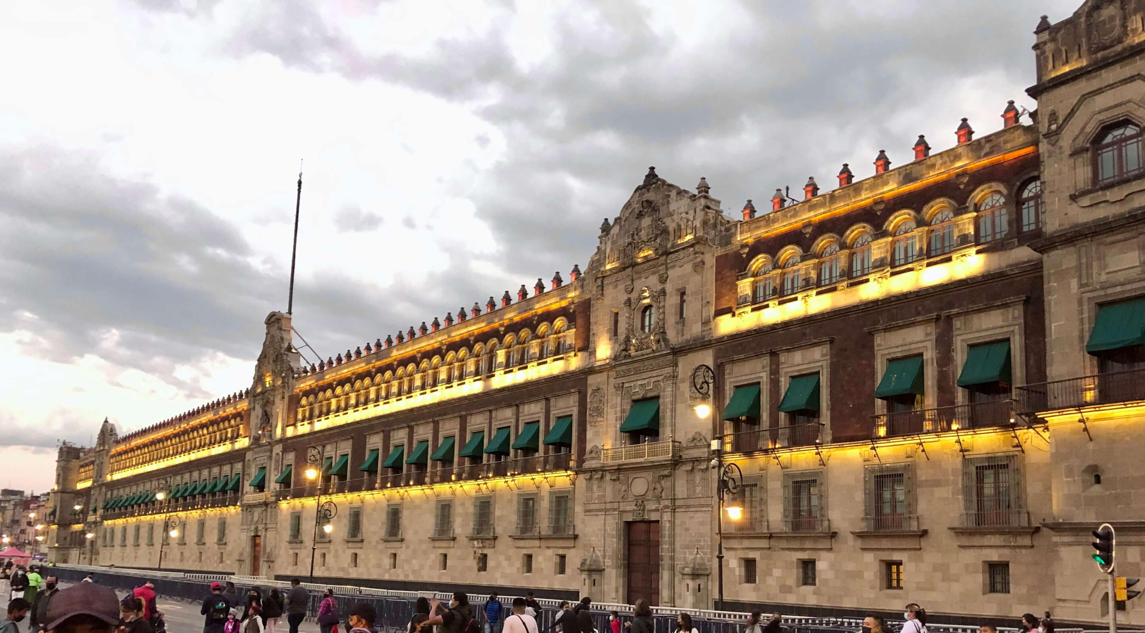 National Palace The National Palace in Mexico City's Zocalo square, illuminated at dusk, showcasing historical architecture during a private tour.